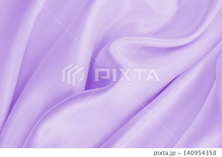 Smooth elegant lilac silk or satin texture as wedding background. Luxurious background design Smooth elegant lilac silk or satin texture as wedding background. Luxurious background design 140954358