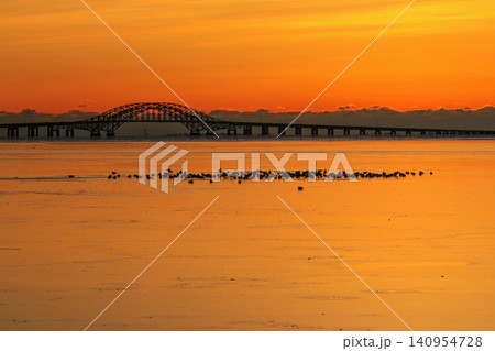 Orange Colored Frozen Great South Bay at Sunrise Near Babylon in 2026 Orange Colored Frozen Great South Bay at Sunrise Near Babylon in 2026 140954728