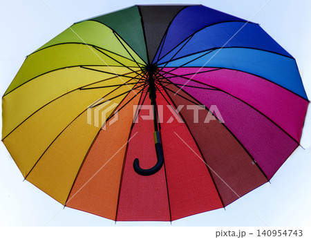 Looking Up at a Colorful Umbrella in Lisbon with a White Background 140954743