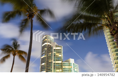 City downtown with skyscraper. Office building in business district. Hiding in palm tree. Skyscraper building architecture. Business skyscraper structure. Modern structural building. Skyscraper city City downtown with skyscraper. Office building in business district. Hiding in palm tree. Skyscraper building architecture. Business skyscraper structure. Modern structural building. Skyscraper city 140954782