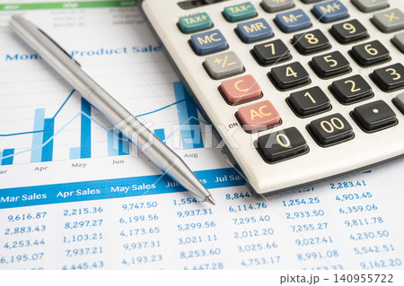 Calculator with pen on data business graphs paper. Calculator with pen on data business graphs paper. 140955722