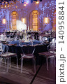 Elegant event hall bathed in warm, ambient lighting 140958841