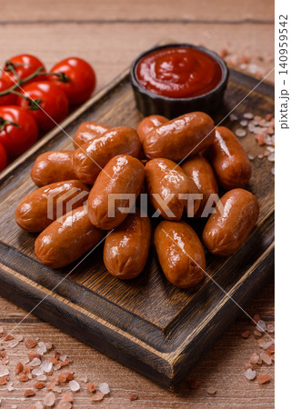 Chicken or pork grilling sausages with garlic, salt, and spices. Grilling sausages Chicken or pork grilling sausages with garlic, salt, and spices. Grilling sausages 140959542