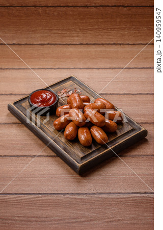 Chicken or pork grilling sausages with garlic, salt, and spices. Grilling sausages Chicken or pork grilling sausages with garlic, salt, and spices. Grilling sausages 140959547
