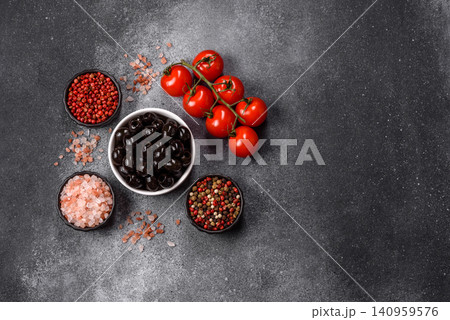 Black canned olives without pits for salads and snacks. Black olives without pits 140959576