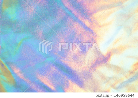 Holographic iridescent pastel texture background with soft metallic shine and abstract color waves Holographic iridescent pastel texture background with soft metallic shine and abstract color waves 140959644