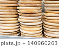 stacks of traditional galician wooden plates for serving octopus 140960263
