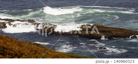 Rough Ocean Waves Crashing into Barrier Rocks off the Coast of Galicia Spain 140960323