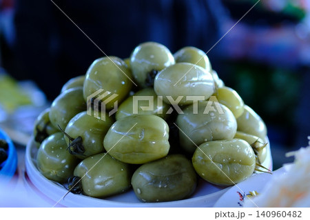 pickled green tomatoes. Natural and healthy pickled green tomatoes 140960482