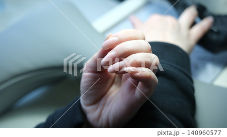 Natural nail recovery after damaged gel polish removal in professional manicure salon. renews weakened nails for healthy natural beauty. Natural nail recovery after damaged gel polish removal in professional manicure salon. renews weakened nails for healthy natural beauty. 140960577