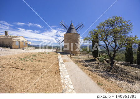 Traditional stone windmill in Saint Saturnin les Apt, Provence, France Traditional stone windmill in Saint Saturnin les Apt, Provence, France 140961893