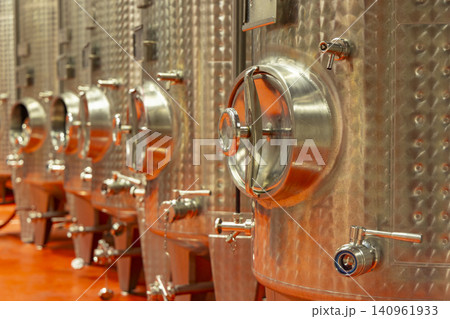 Stainless steel tanks storing cider brewing processing in Cleden Cap Sizun 140961933
