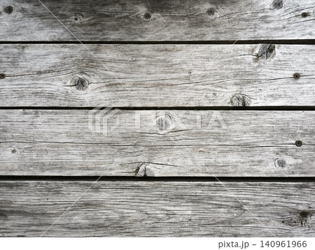 Grayish-white texture of aged wooden boards 140961966