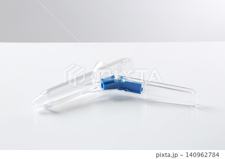 Medical anoscope isolated on white. Hemorrhoid treatment 140962784