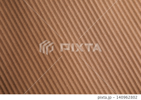 Brown corrugated sheet of cardboard as background, top view Brown corrugated sheet of cardboard as background, top view 140962802