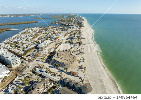 Hurricane Milton aftermath cleanup. Sand piles at Englewood Beach on Manasota Key. Sand recipient site after storm surge Hurricane Milton aftermath cleanup. Sand piles at Englewood Beach on Manasota Key. Sand recipient site after storm surge 140964464