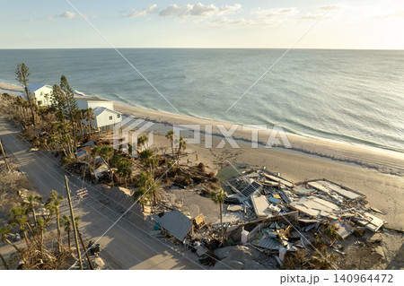 Destroyed houses on ocean coast. Hurricane Milton consequences in Englewood, Florida. Storm surge severe damage Destroyed houses on ocean coast. Hurricane Milton consequences in Englewood, Florida. Storm surge severe damage 140964472