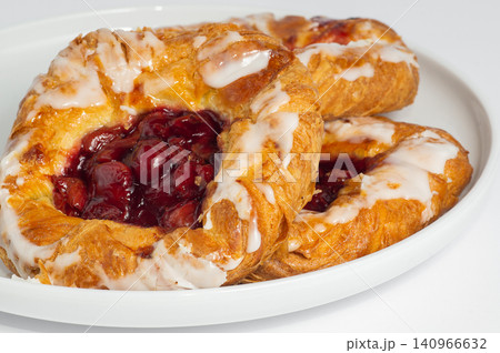 Cherry filled danish on white background Cherry filled danish on white background 140966632