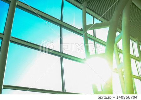 Interior of modern architecture, modern city building. Windows of building, interior design. Details of modern architecture. Building abstract. Building background. Interior of modern architecture, modern city building. Windows of building, interior design. Details of modern architecture. Building abstract. Building background. 140966704