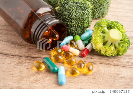 Drug with broccoli vegetable for healthy food. Drug with broccoli vegetable for healthy food. 140967137