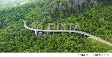 Linn Cove Viaduct road bridge in North Carolina Appalachian mountains, USA. Blue Ridge Parkway American highway in summer rain season Linn Cove Viaduct road bridge in North Carolina Appalachian mountains, USA. Blue Ridge Parkway American highway in summer rain season 140968329