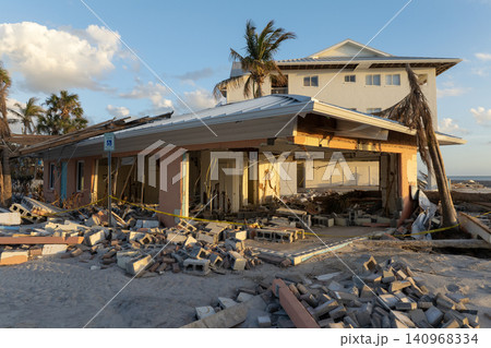Hurricane Milton storm surge severe damage to waterfront house on Manasota Key, Florida. Destroyed home on gulf coast 140968334