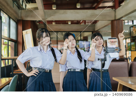 Group of teen student live dancing, Social Media Creator, Teen Influencer, Video Content Creator. Group of teen student live dancing, Social Media Creator, Teen Influencer, Video Content Creator. 140969086