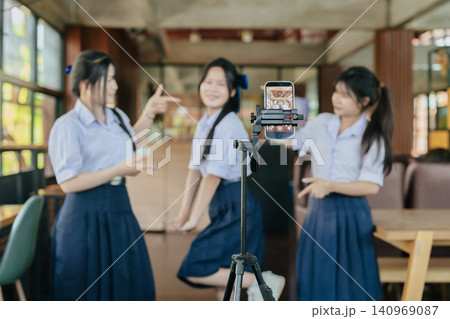 Group of teen student live dancing, Social Media Creator, Teen Influencer, Video Content Creator. Group of teen student live dancing, Social Media Creator, Teen Influencer, Video Content Creator. 140969087