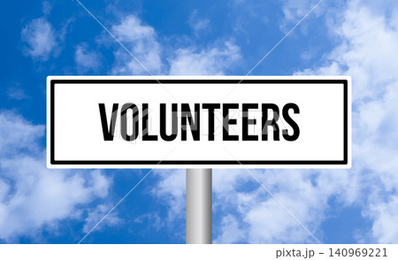 Volunteers road sign on cloudy sky background Volunteers road sign on cloudy sky background 140969221