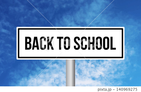 Back to school road sign on cloudy sky background Back to school road sign on cloudy sky background 140969275