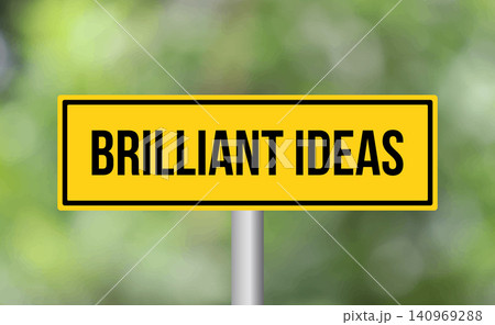 Brilliant ideas road sign on blur background Brilliant ideas road sign on blur background 140969288