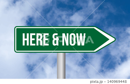 Here & now road sign on blue sky background Here & now road sign on blue sky background 140969448