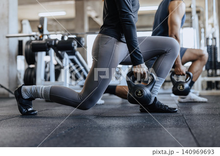 Kettlebell workout, Fitness training, Gym exercise, Strength workout, Sport lifestyle Kettlebell workout, Fitness training, Gym exercise, Strength workout, Sport lifestyle 140969693