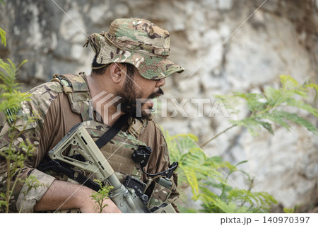 Special forces ranger battle in jungle terrain during border secure military operation Special forces ranger battle in jungle terrain during border secure military operation 140970397