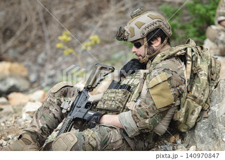 Military special forces soldier team in combat operation, tactical military portrait in action 140970847