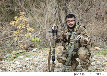 Military special forces soldier team in combat operation, tactical military portrait in action 140970967