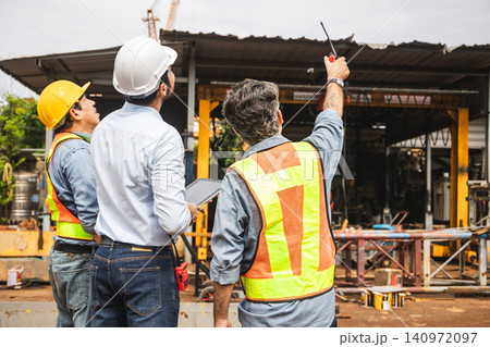 Professional construction Indian engineer teamwork, Builder meeting together talking together. 140972097