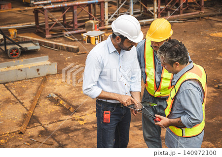 Professional construction Indian engineer teamwork, Builder meeting together talking together. 140972100