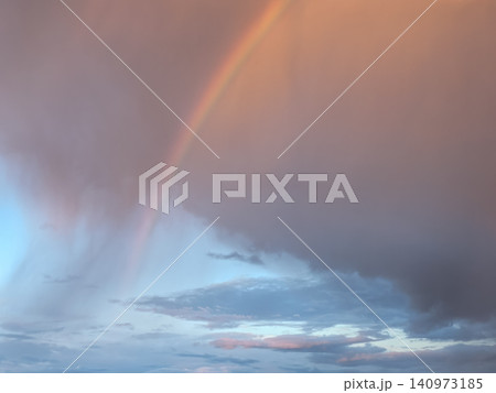 Double rainbow over dramatic storm clouds at sunset Double rainbow over dramatic storm clouds at sunset 140973185