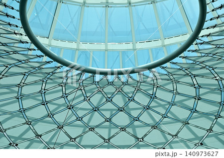 The low angle view of the building ceiling. Interior of modern architecture, modern city building. Interior design. Details of modern architecture. Building abstract. Building background. The low angle view of the building ceiling. Interior of modern architecture, modern city building. Interior design. Details of modern architecture. Building abstract. Building background. 140973627