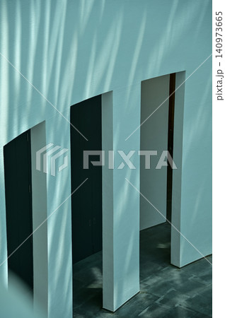 Close-up of the wall, interior of modern architecture, modern city building. Interior design. Details of modern architecture. Building abstract. Building background. Close-up of the wall, interior of modern architecture, modern city building. Interior design. Details of modern architecture. Building abstract. Building background. 140973665