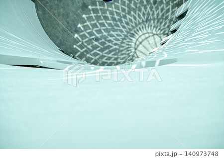 Looking down from the height, close-up of the wall. Interior of contemporary architecture, modern city building. Modern architecture abstract background, building abstract 140973748
