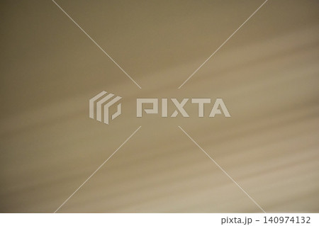 Sun rays on the wall. Soft lines from sun rays on the wall. Abstract background. Light background with sun rays. Soft focus. Gradient pattern from sun rays on the wall. Sun rays on the wall. Soft lines from sun rays on the wall. Abstract background. Light background with sun rays. Soft focus. Gradient pattern from sun rays on the wall. 140974132