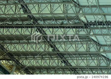 Close-up of the stadium ceiling. Modern architecture, modern city building. Exterior design. Details of modern architecture. Building abstract. Building background. Close-up of the stadium ceiling. Modern architecture, modern city building. Exterior design. Details of modern architecture. Building abstract. Building background. 140974196