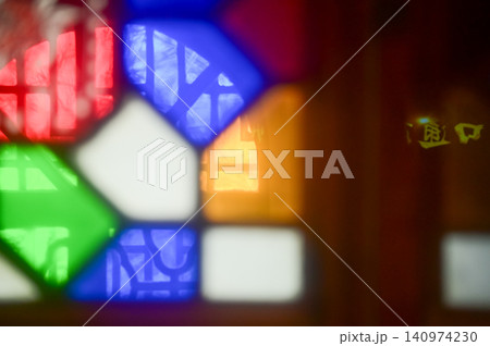 Colorful classic glass window with grid. Colorful abstract stained glass window pattern background. Classic pattern. Building abstract. Building background. Colorful classic glass window with grid. Colorful abstract stained glass window pattern background. Classic pattern. Building abstract. Building background. 140974230