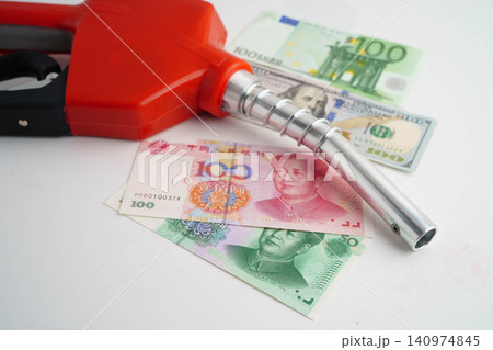 Gas pump, Fuel Nozzle with banknote money for cost energy. Gas pump, Fuel Nozzle with banknote money for cost energy. 140974845