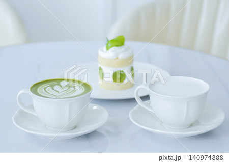 green tea or matcha green tea, milk green tea or matcha latte or matcha green tea latte with hot milk and cake 140974888
