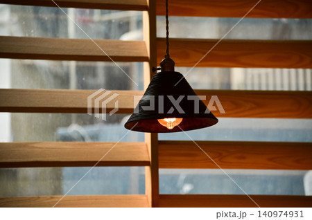 Close-up of the lighting indoors. Light bulb. Interior design, decoration. Lighting equipment. Close-up of the lighting indoors. Light bulb. Interior design, decoration. Lighting equipment. 140974931