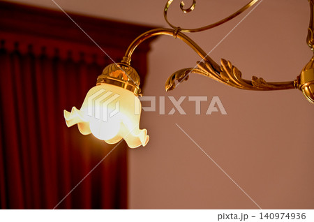 Close-up of the lighting indoors. Light bulb. Interior design, decoration. Lighting equipment. 140974936
