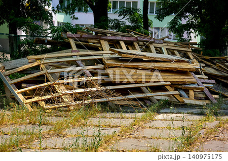 After construction.Wooden waste, trash cleaning After construction.Wooden waste, trash cleaning 140975175
